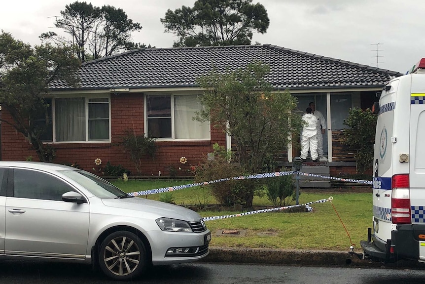 A house taped off with police tape