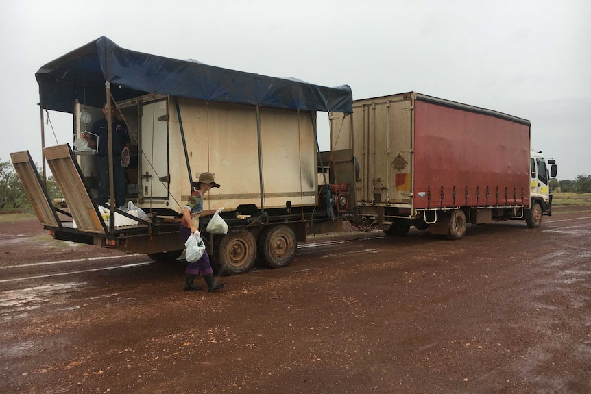 A truck and trailer on an outback dirt road