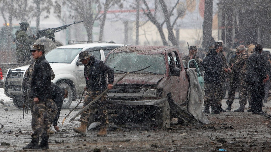 Afghan forces investigate car bomb attack