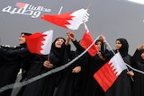 Shiite protesters chain themselves during a women's anti-government demonstration in Bahrain