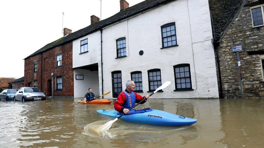 Canoes used in floodwaters west of London.