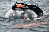 Russian president Vladimir Putin submerges