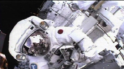 Soichi Noguchi of Japan steps out in space.