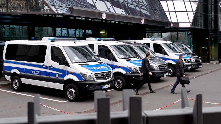 German police outside Deutsche Bank headquarters in Frankfurt