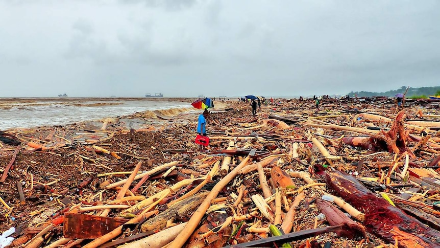 Debris lays strewn across the shorefront after days of heavy rain in the Solomon Islands.