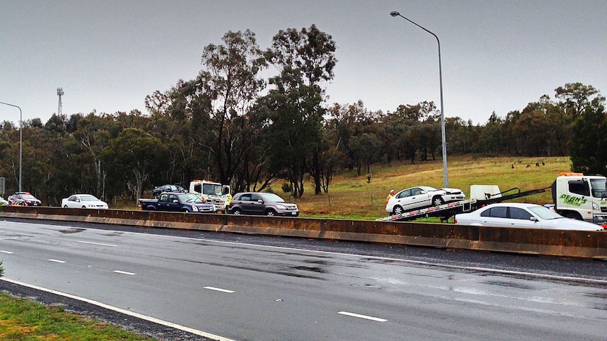 Heavy rain has caused chaos on the roads with a five car accident reported on the Tuggeranong Parkway.
