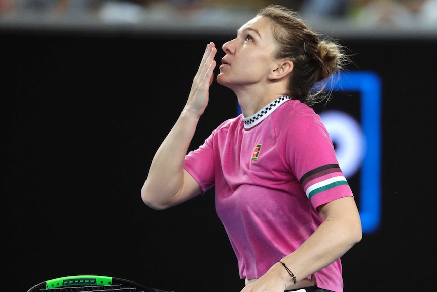 Simona Halep blows a kiss to the sky after defeating Kaia Kanepi at Australian Open.