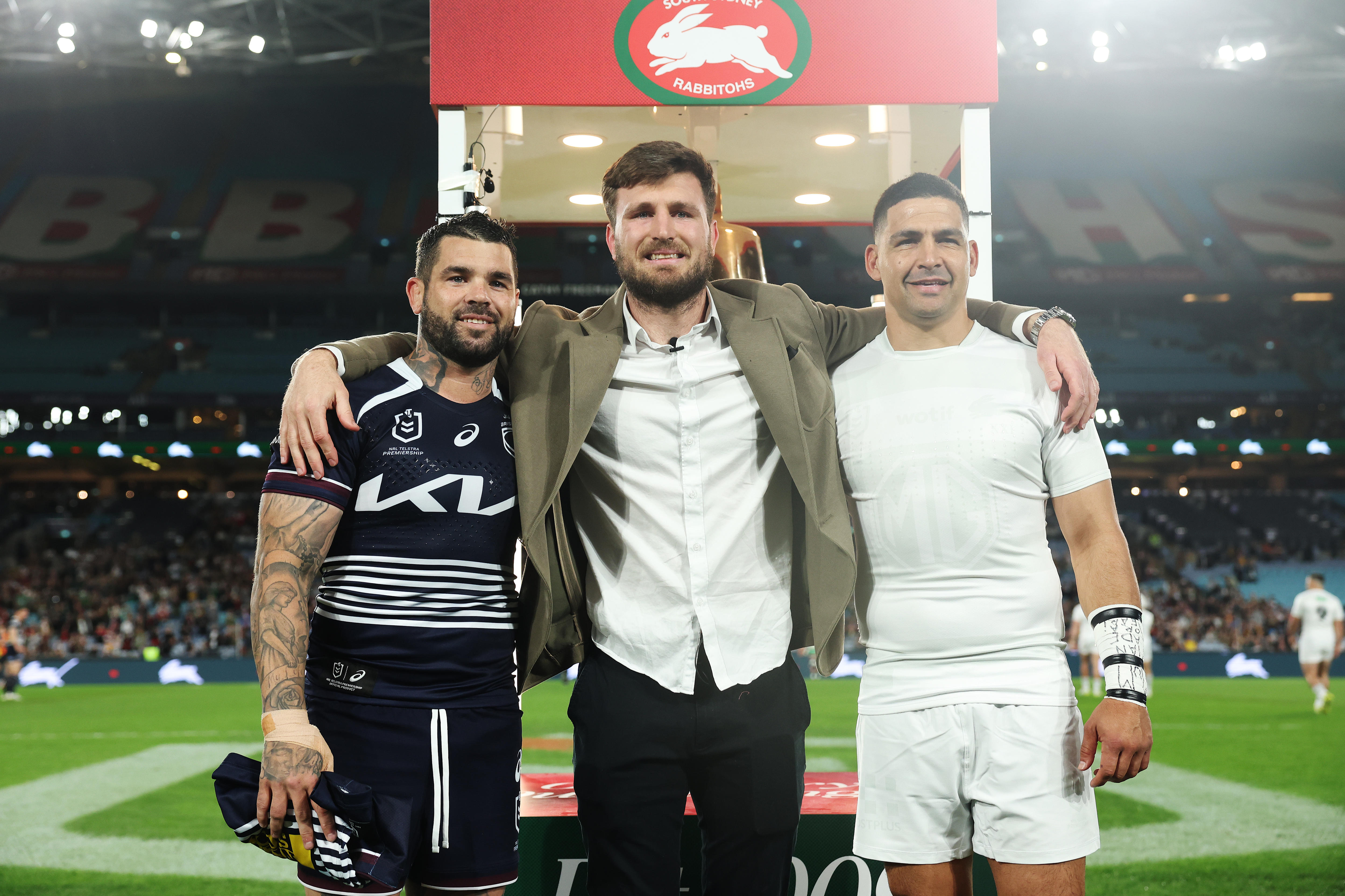 Jai Arrow poses with Adam Reynolds of the Broncos and Cody Walker of the Rabbitohs