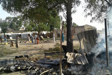 Burnt out shelter camp for displaced people in Rann