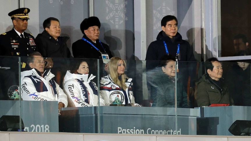 Diplomats watch the closing ceremony