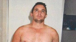 With a tattoo of crossed pistols is Aaron Carlino arrested over murder of Cookson, whose head washed up on Rottnest
