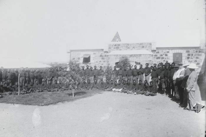 Aboriginal prisoners in the courtyard of the Rottnest Island Prison, circa 1883.