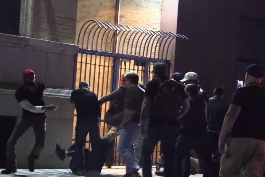 Still from video of the fight with anti-fascist protesters in New York