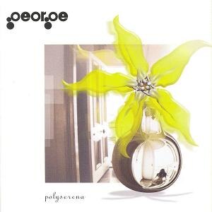 An album cover featuring a yellow flower-like Christmas tree ornament.