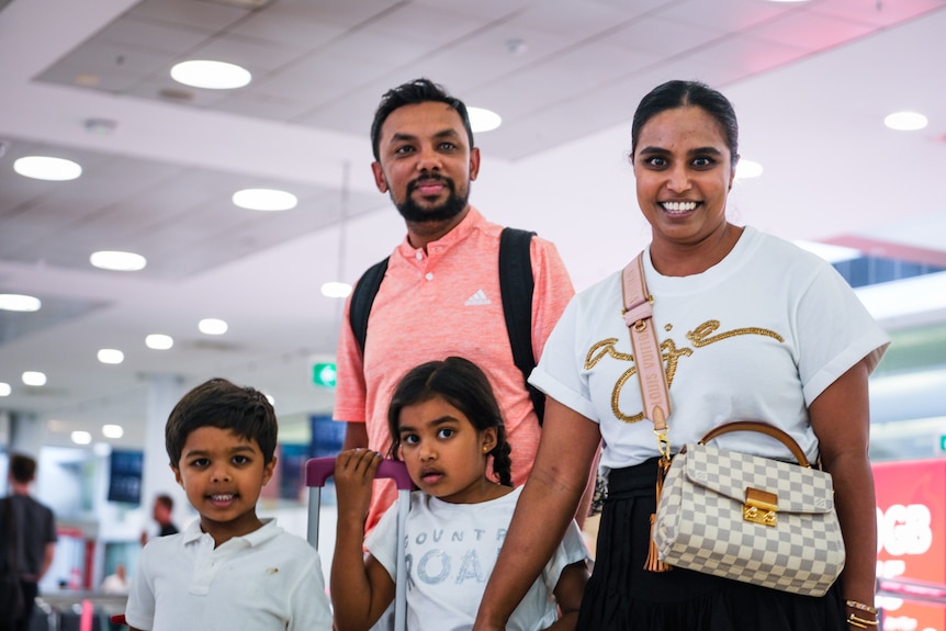 A man, woman and two children