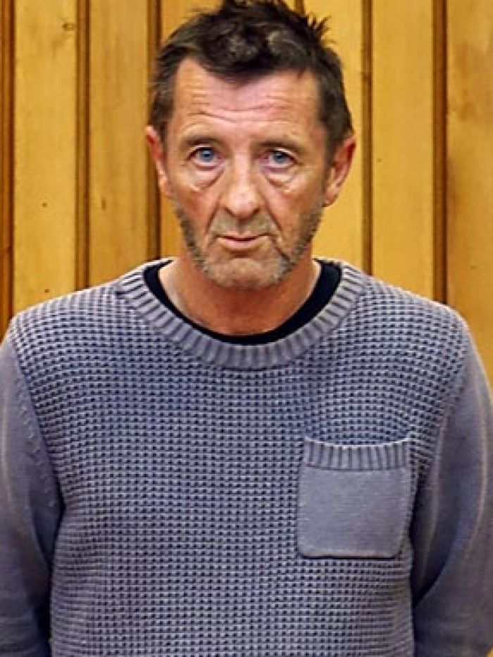 AC/DC drummer Phil Rudd charged with attempting to hire hitman to ...