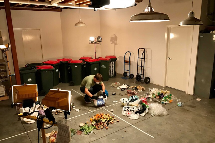 War on Waste Craig Reucassel sorting rubbish during filming of the program in 2017.
