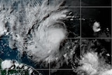 A hurrican storm is in white clouds forming on world map 