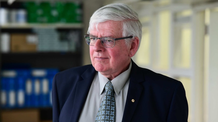 Associate Professor Michael Woodward looking outside