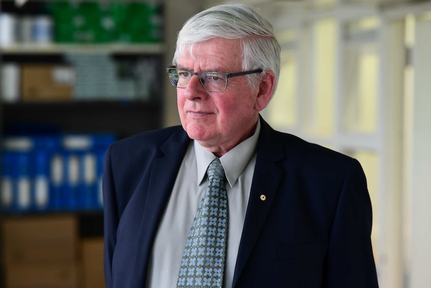 Associate Professor Michael Woodward looking outside