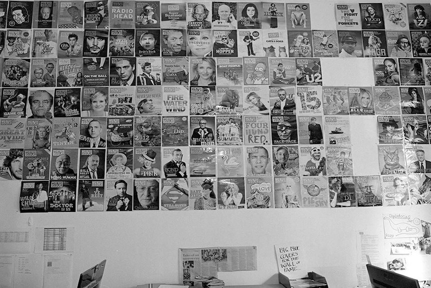 Big Issue covers on a wall