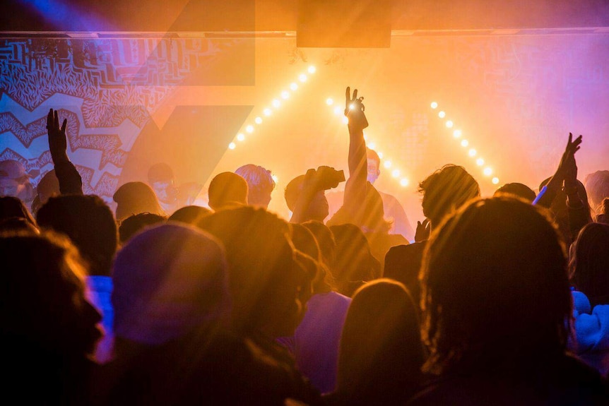 People dancing in a nightclub.