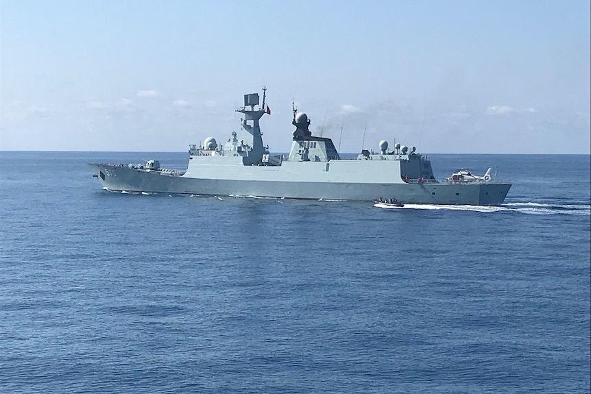 HMAS Newcastle spots visiting Chinese warship the Huangshan in the Timor Sea.