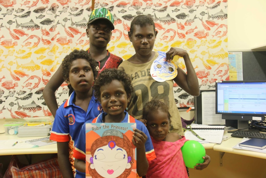 Tiwi Islands woman Xaviarina Poantiumilui with four of her five children at a clinic.