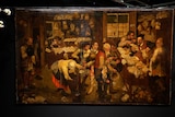 A dark oil painting showing a crowded village lawyer's office in the 17th century.