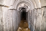A view of a narrow underground tunnel.