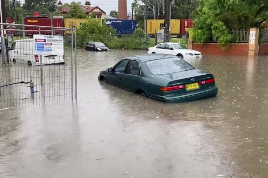 Cars submerged in flood waters