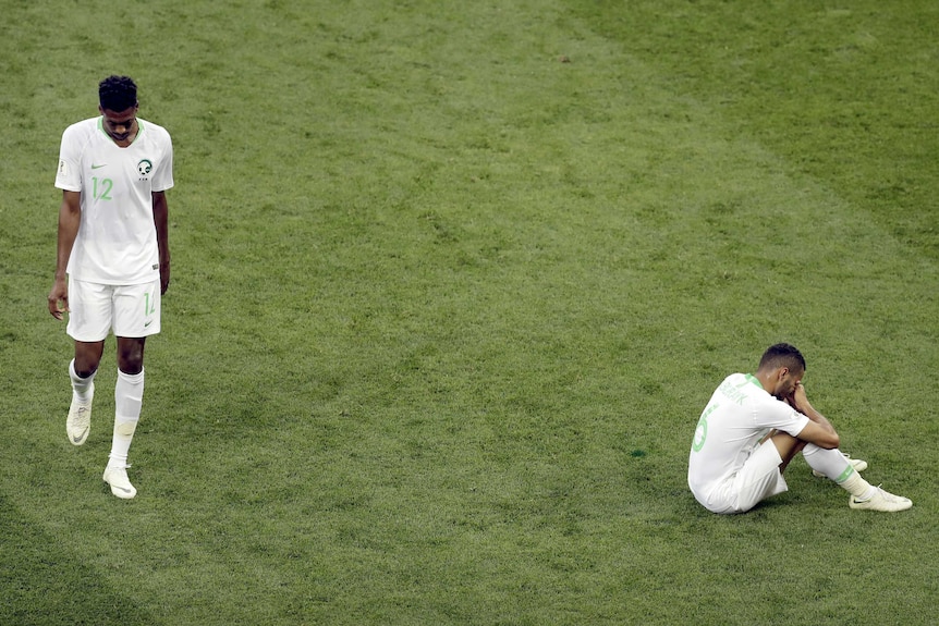 Saudi Arabia players look sad after exit