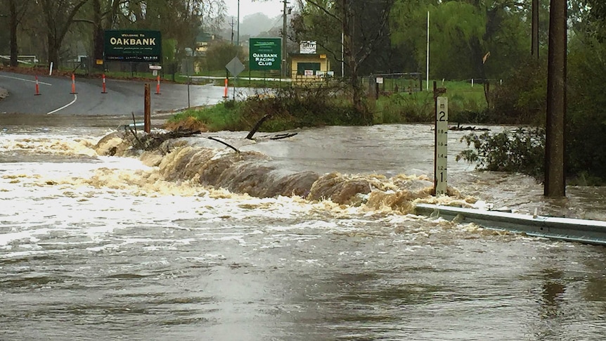 The Onkaparinga River floods at Oakbank