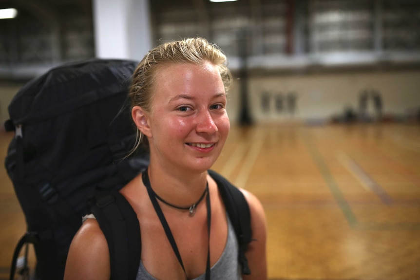 German backpacker Clarissa Widder standing inside the evacuation centre.