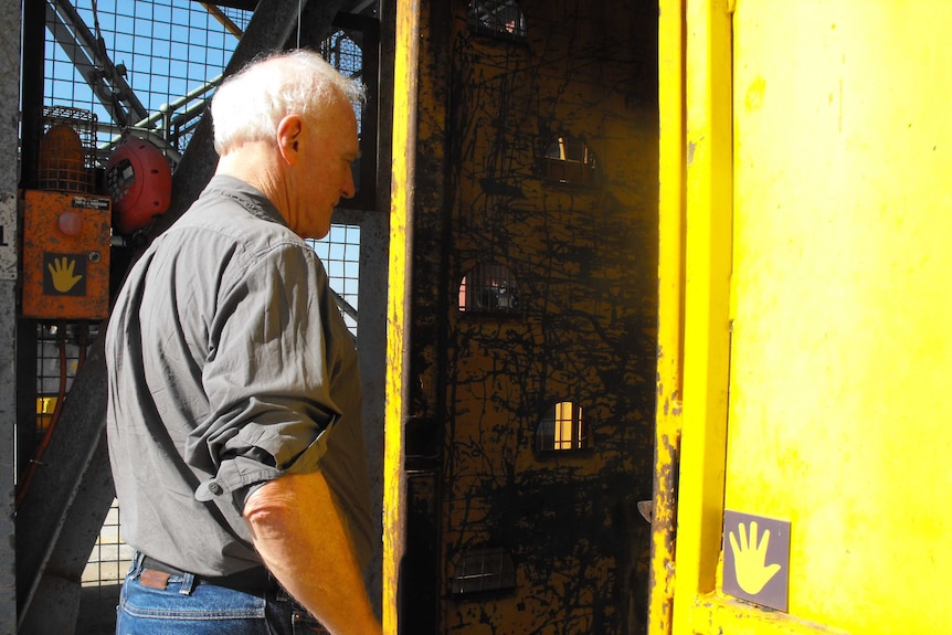 Professor Michael Quinlan inspecting the Beaconsfield mine site