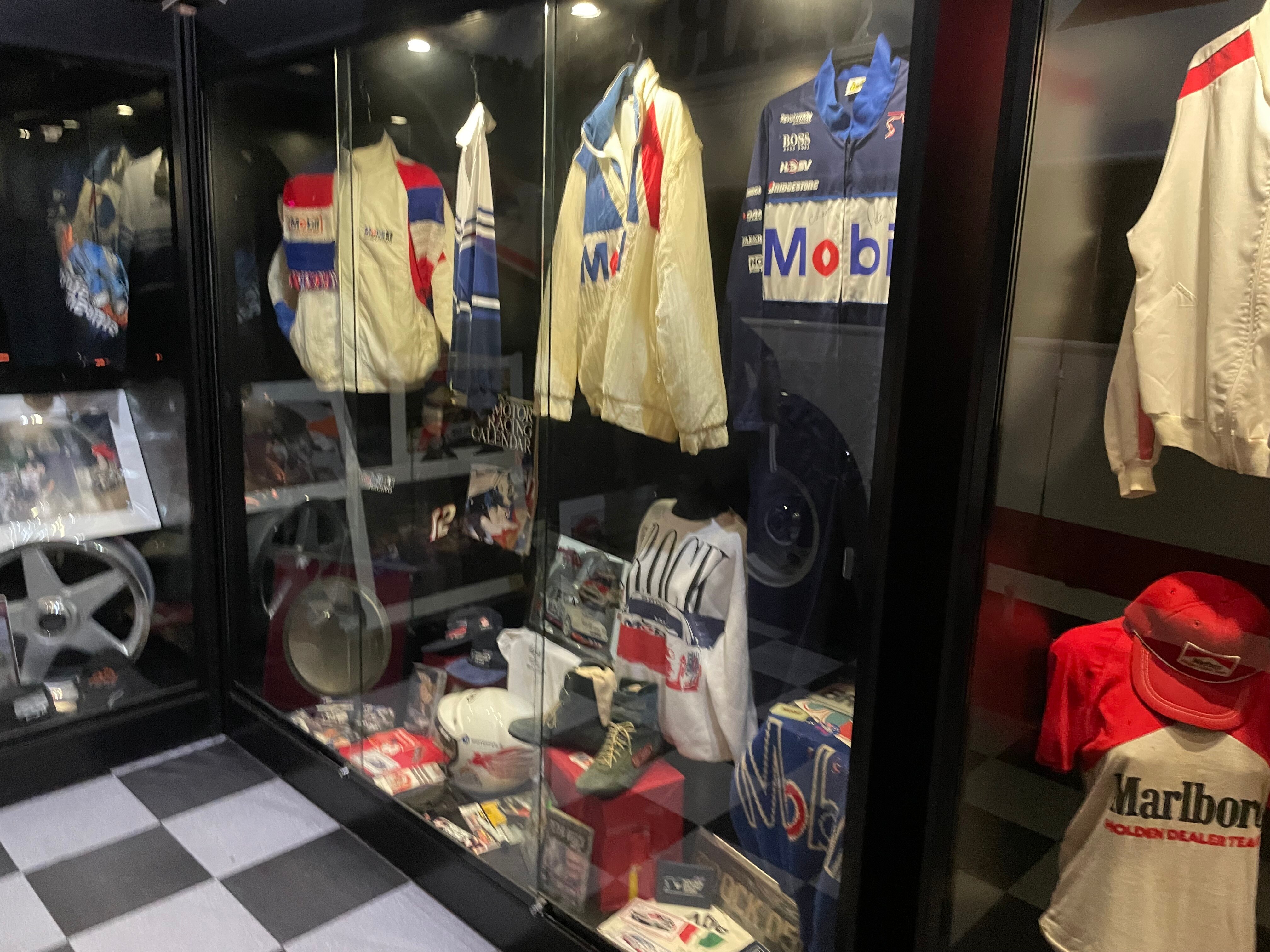 The racing suits of the Australian racing driver Peter Brocks are in a showcase by Peter Champion.