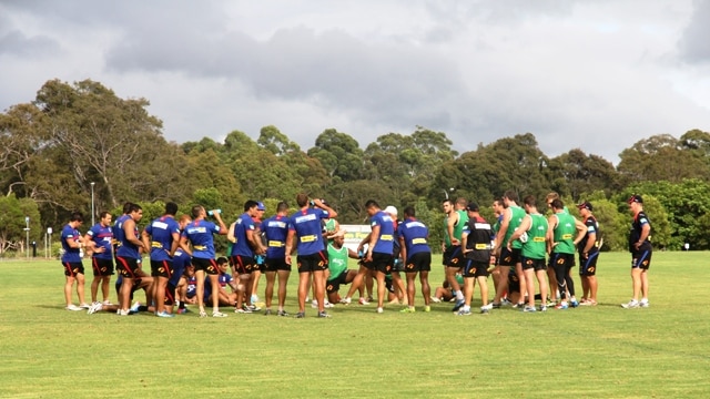 The Newcastle Knights gather for a post-training pep talk this morning.