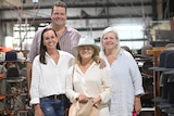 Nicola Forrest, Stephen Keir and his sisters Nikki McLeod and Stacey McIntyre stand inside the Kempsey Akubra factory.