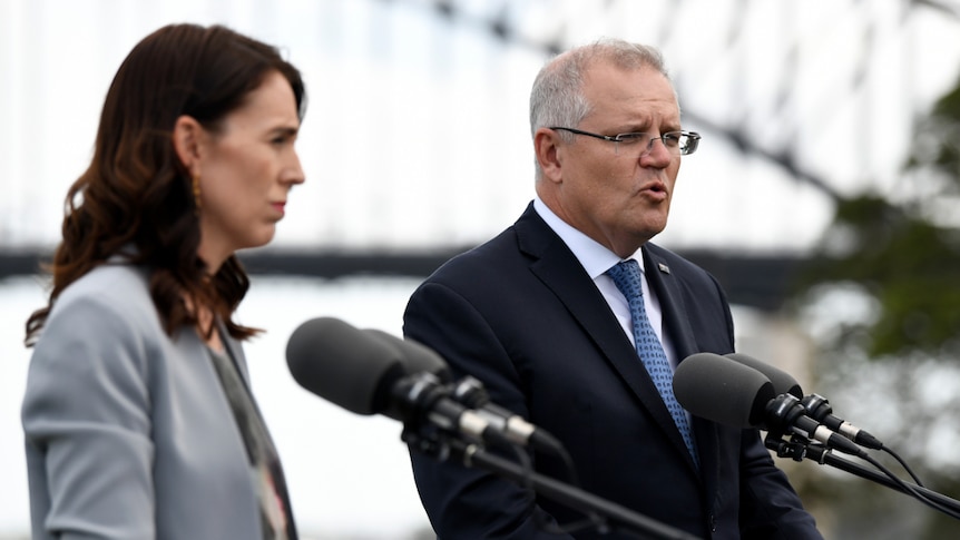 Jacinda Ardern and Scott Morrison speak at a media conference in Sydney.