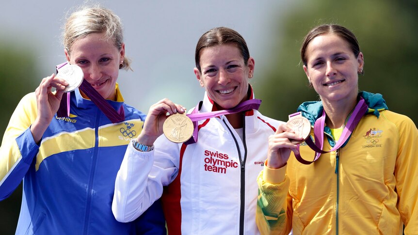Triathlon medallists on podium at the London 2012 Olympic Games.