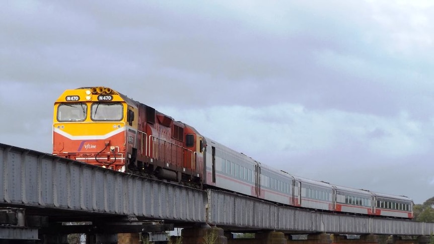 Photo of a morning V-Line service to Bairnsdale, crossing the Avon River Rail Bridge at Stratford.