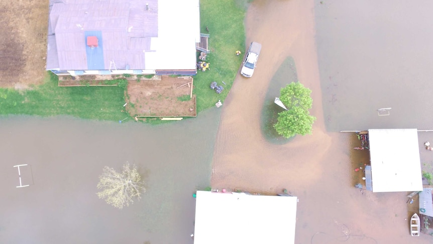 An aerial view of a flooded property in Forbes.
