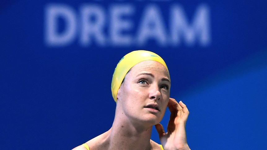 Cate Campbell looks up into the stands at an Australian training session on the Gold Coast.