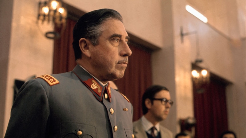 General Pinochet in military uniform address the press after the 1973 coup