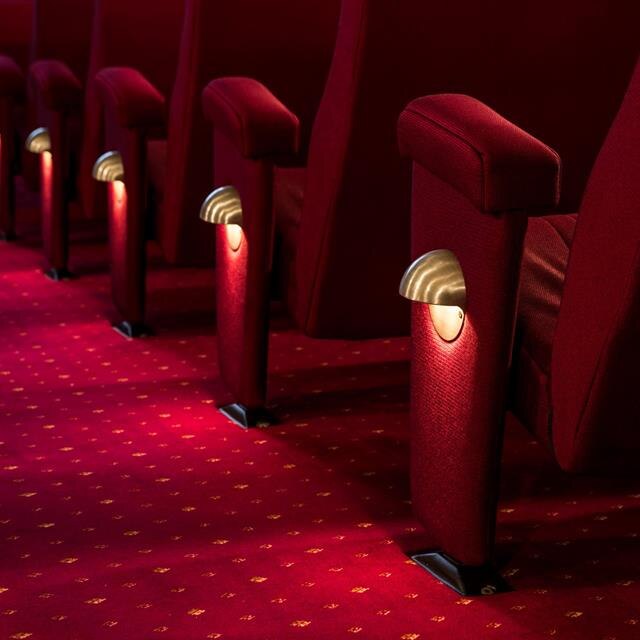 Close-up of State Cinema aisle and seats.
