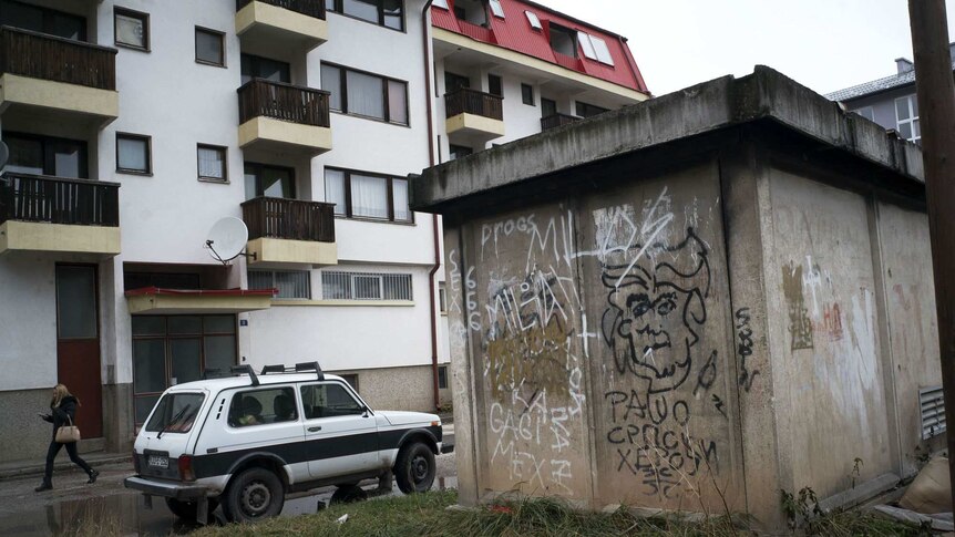In Pale, graffiti about convicted war criminal Radovan Karadzi declares him a "Serb hero".