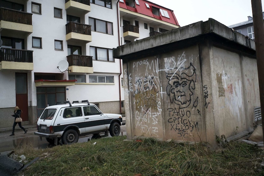 In Pale, graffiti about convicted war criminal Radovan Karadzi declares him a "Serb hero".