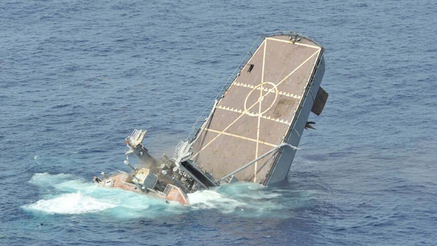 Former US Navy Ship Kilauea breaks apart and sinks following a torpedo attack