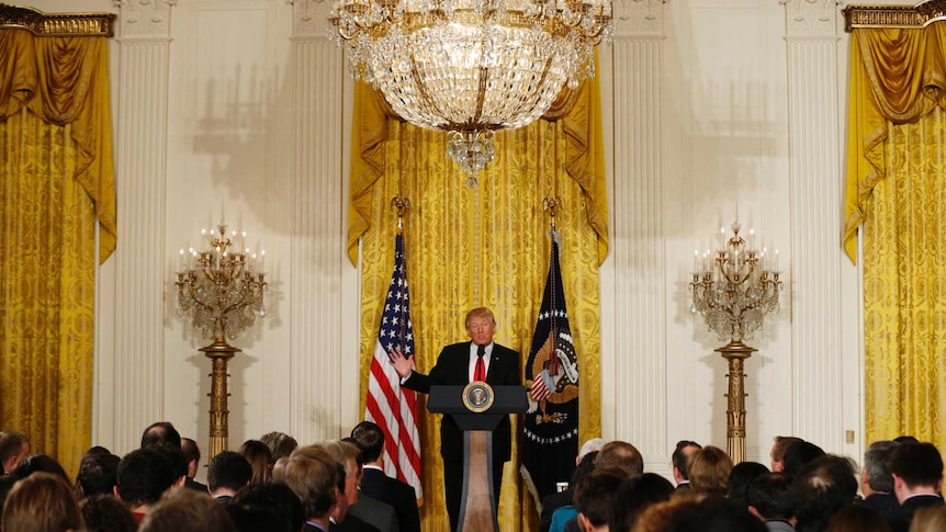 US President Donald Trump addresses the media