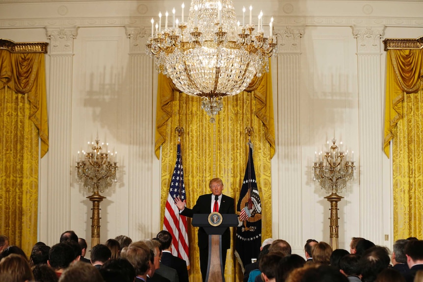 US President Donald Trump addresses the media